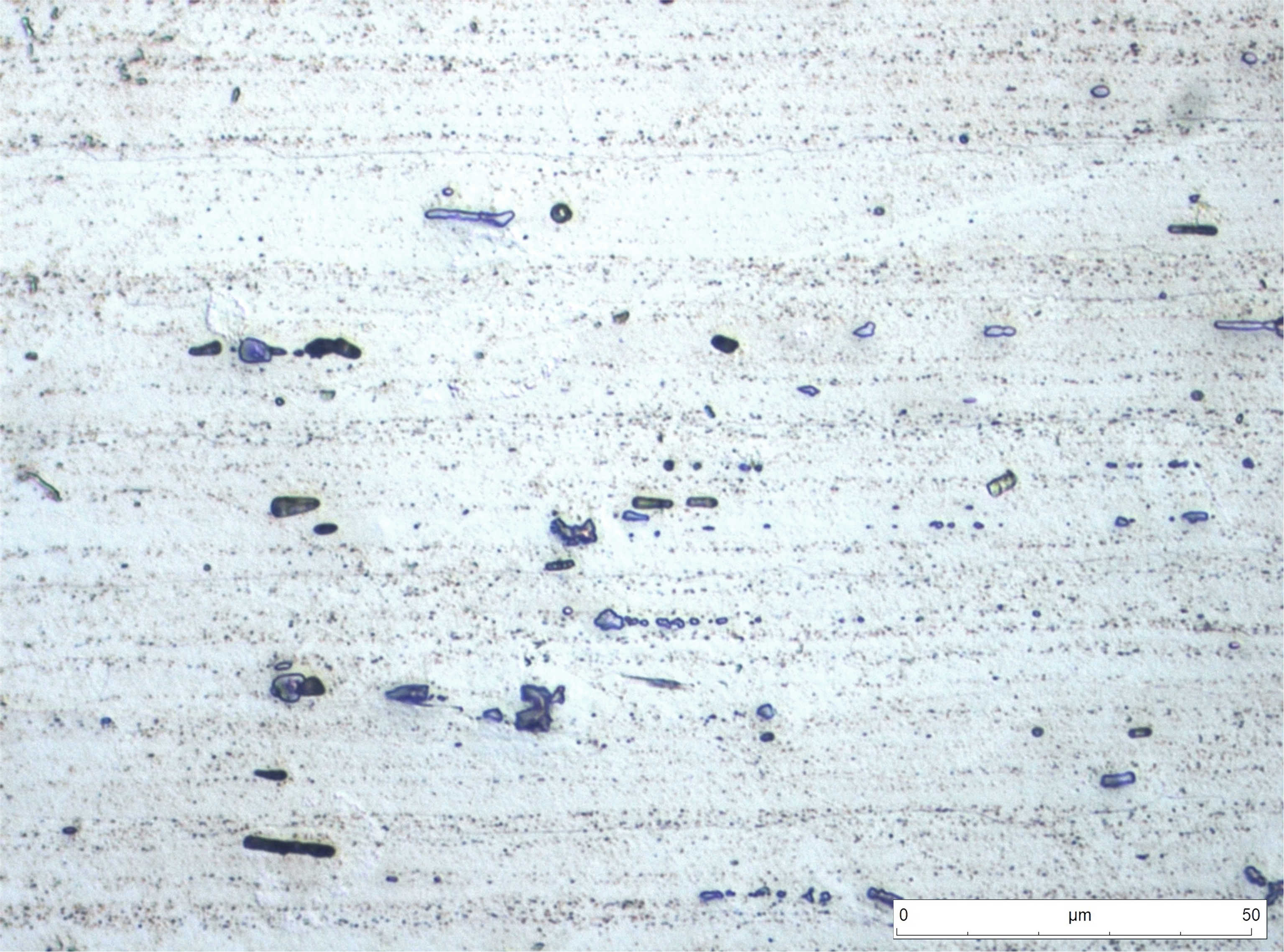 Similar a la anterior. La dificultad de la identificación de los compuestos químicos en las aleaciones de aluminio mediante microscopía óptica radica en la gran cantidad de compuestos posible que pueden formarse entre los diferentes elementos de aleación.